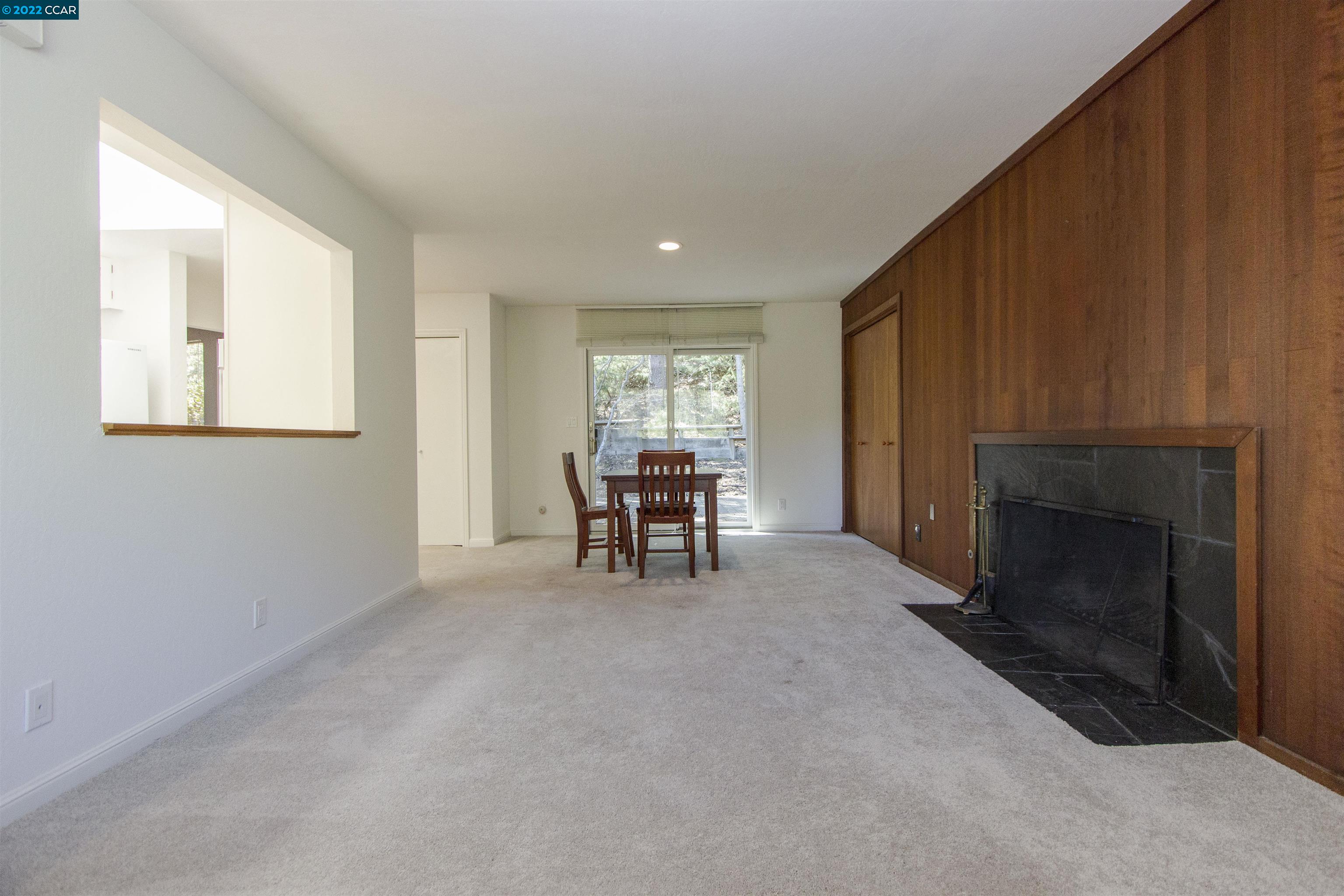 3399 Springhill Road Lafayette, CA 94549 - Photo 7 of 25 a living room with furniture and a fireplace
