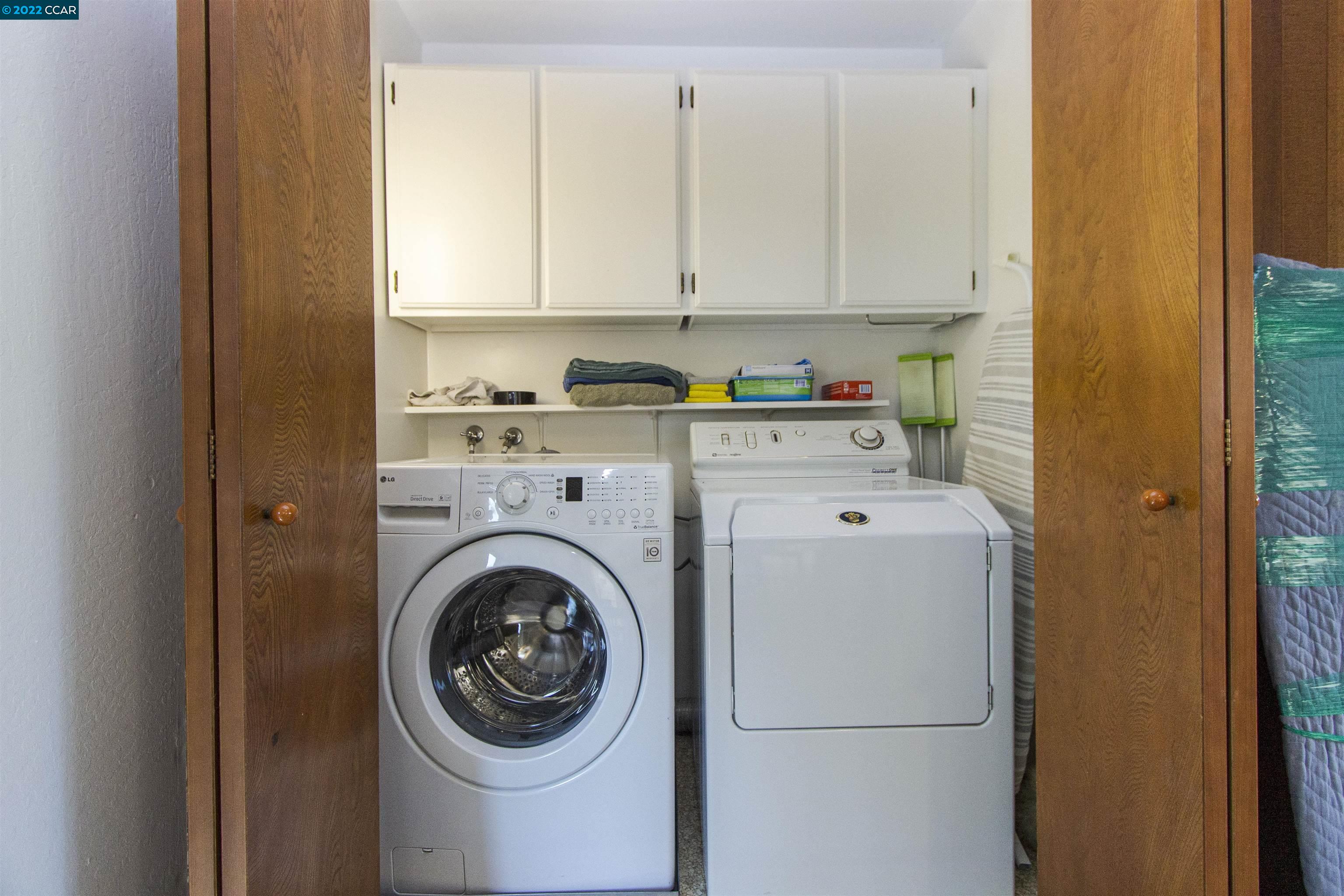 3399 Springhill Road Lafayette, CA 94549 - Photo 9 of 25 a utility room with dryer and washer