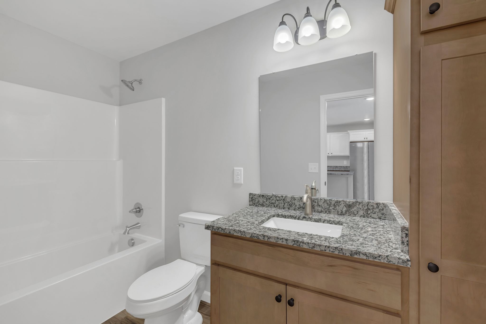 25 Glasner Lane Winchester, TN 37398 - Photo 13 of 32 a bathroom with a granite countertop sink a toilet and shower