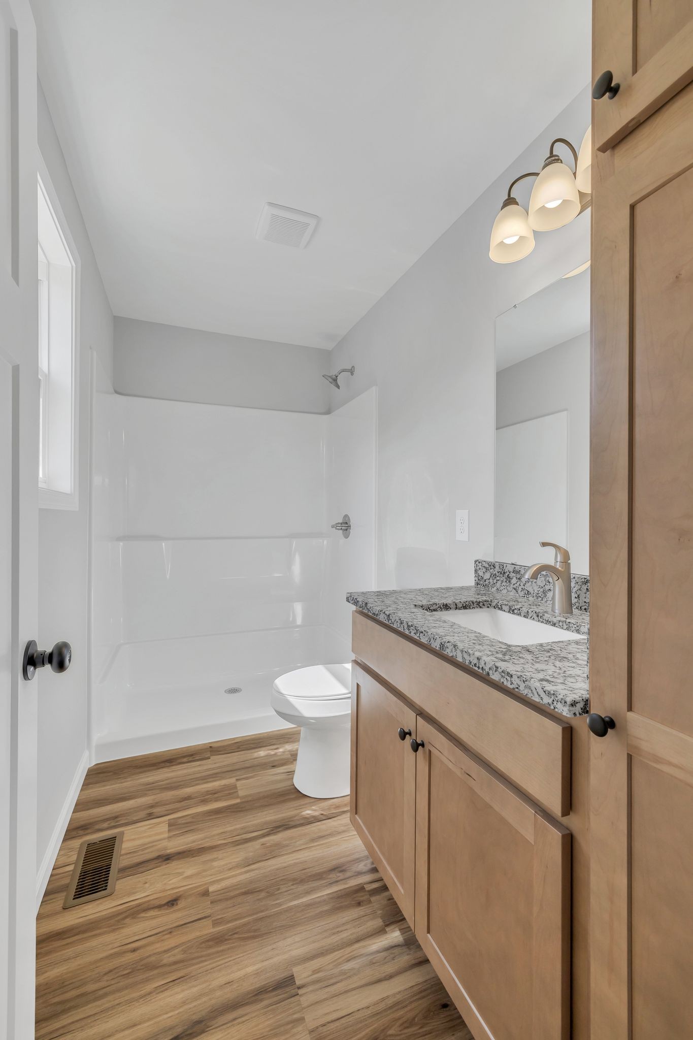 25 Glasner Lane Winchester, TN 37398 - Photo 21 of 32 a bathroom with a granite countertop sink and a mirror