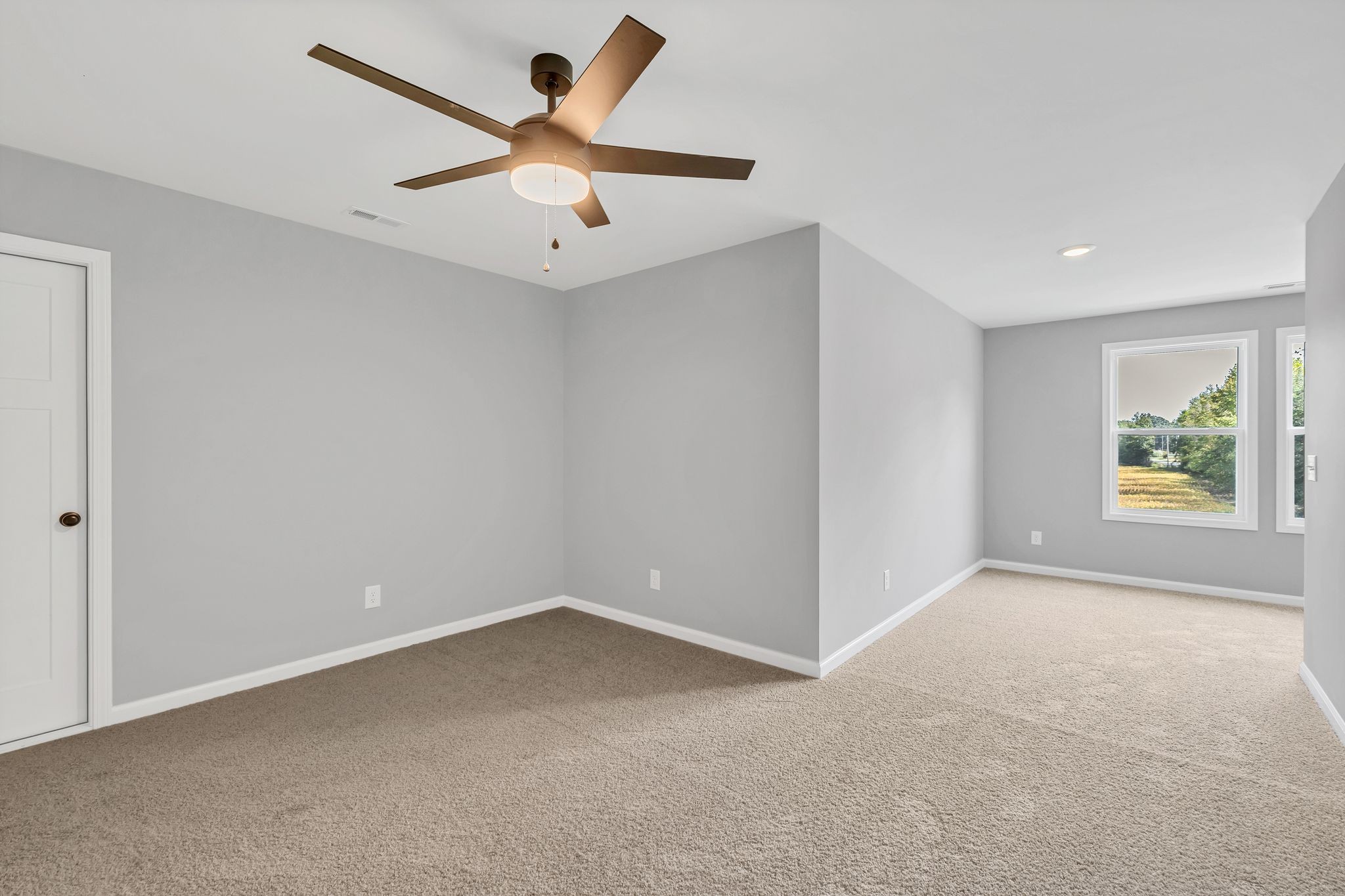 25 Glasner Lane Winchester, TN 37398 - Photo 24 of 32 an empty room with ceiling fan and windows