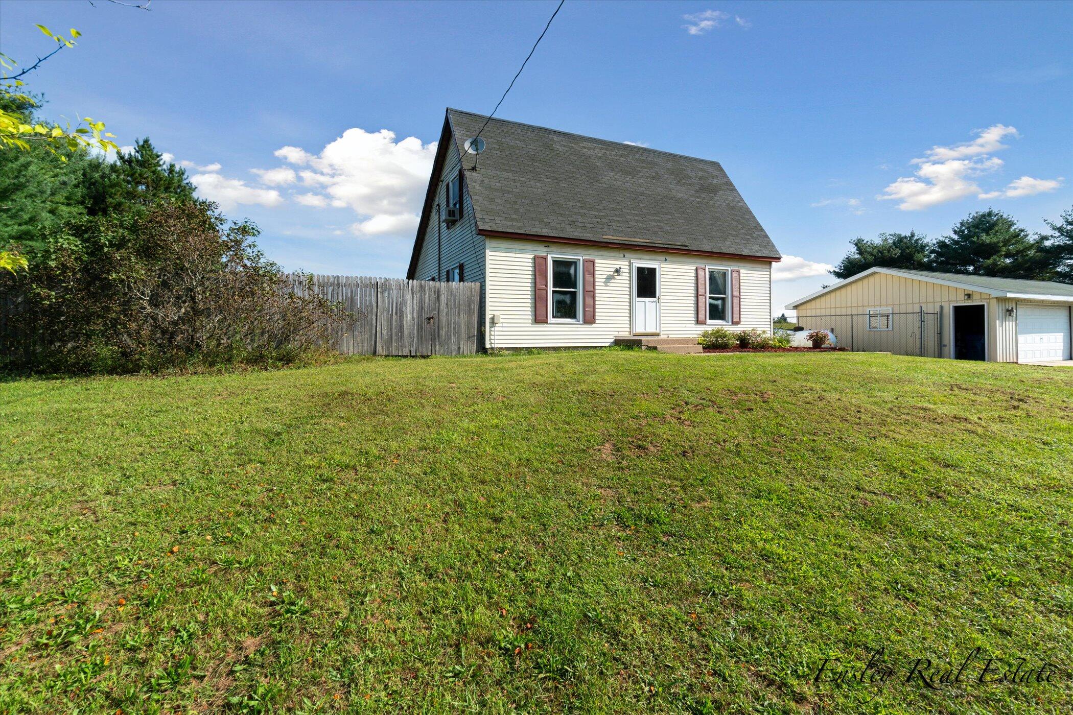 18950 22 Mile Road Northeast Pierson, MI 49339 - Photo 2 of 58 002-18950-22-Mile-Rd-NE-WindowStill-Real