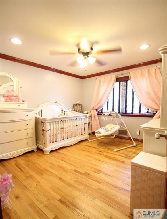 14 Nottingham Road Edison, NJ 08820 - Photo 6 of 19 a view of a room with gym equipment