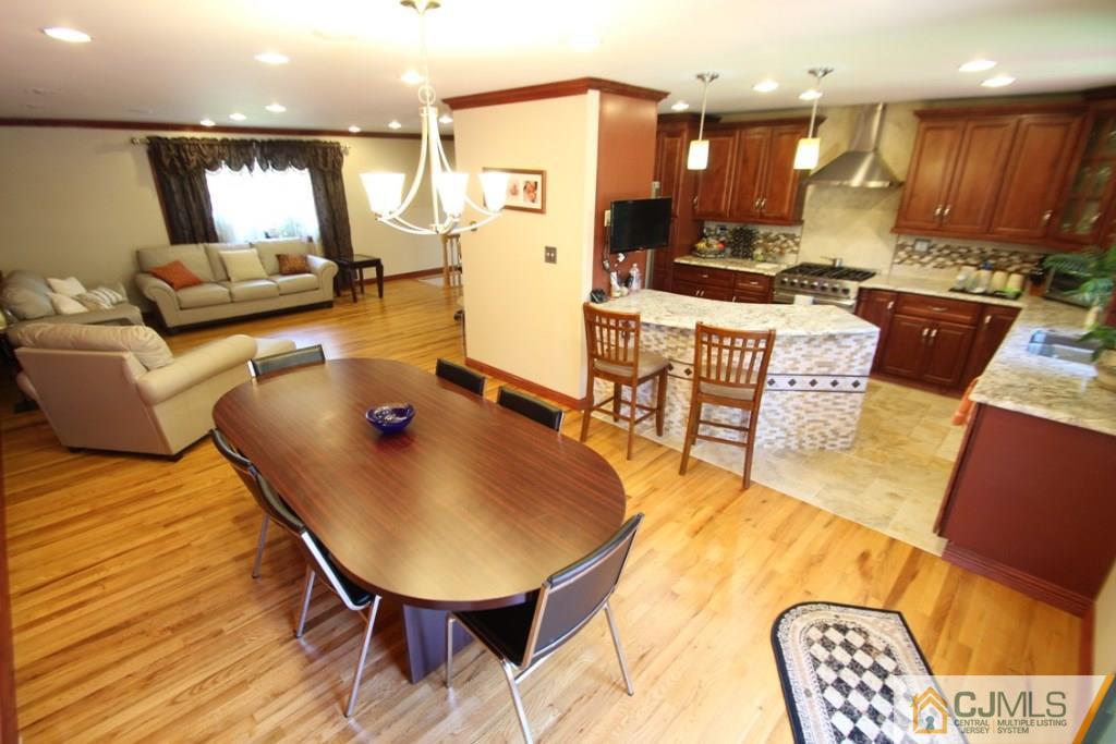 14 Nottingham Road Edison, NJ 08820 - Photo 10 of 19 a living room with furniture and kitchen view