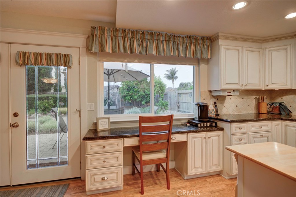 330 Stagecoach Road Arroyo Grande, CA 93420 - Photo 17 of 60 Bright kitchen featuring ample counter space and a cozy nook, perfect for casual dining or work.