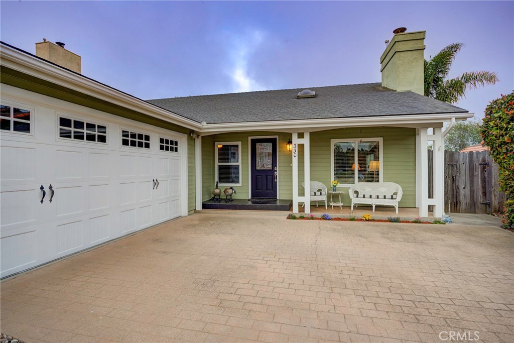 330 Stagecoach Road Arroyo Grande, CA 93420 - Photo 2 of 60 Meticulously maintained home featuring a welcoming porch, spacious driveway, and lush landscaping for outdoor enjoyment.