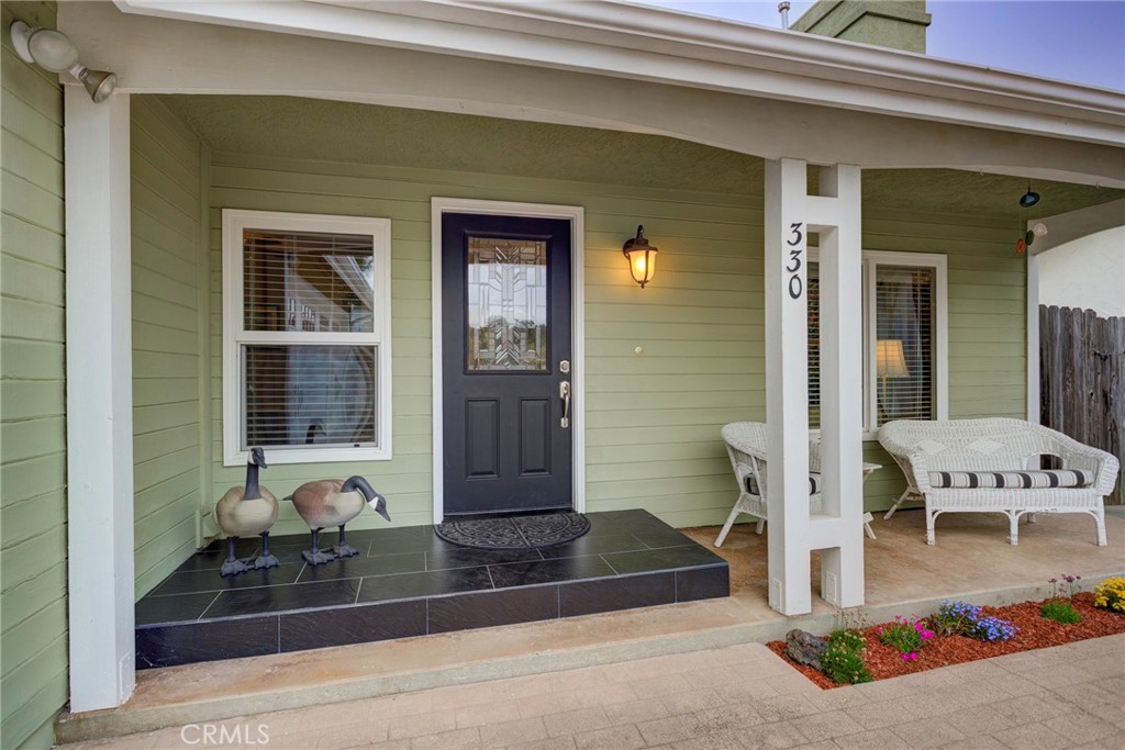 330 Stagecoach Road Arroyo Grande, CA 93420 - Photo 3 of 60 Inviting front porch with modern details, perfect for relaxing and enjoying the neighborhood’s ambiance.