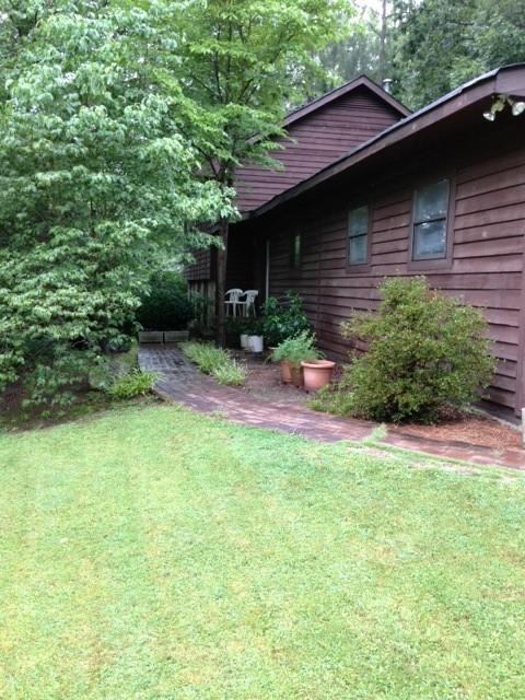 3315 Canterbury Trail Rex, GA 30273 - Photo 22 of 22 a backyard of a house with seating space