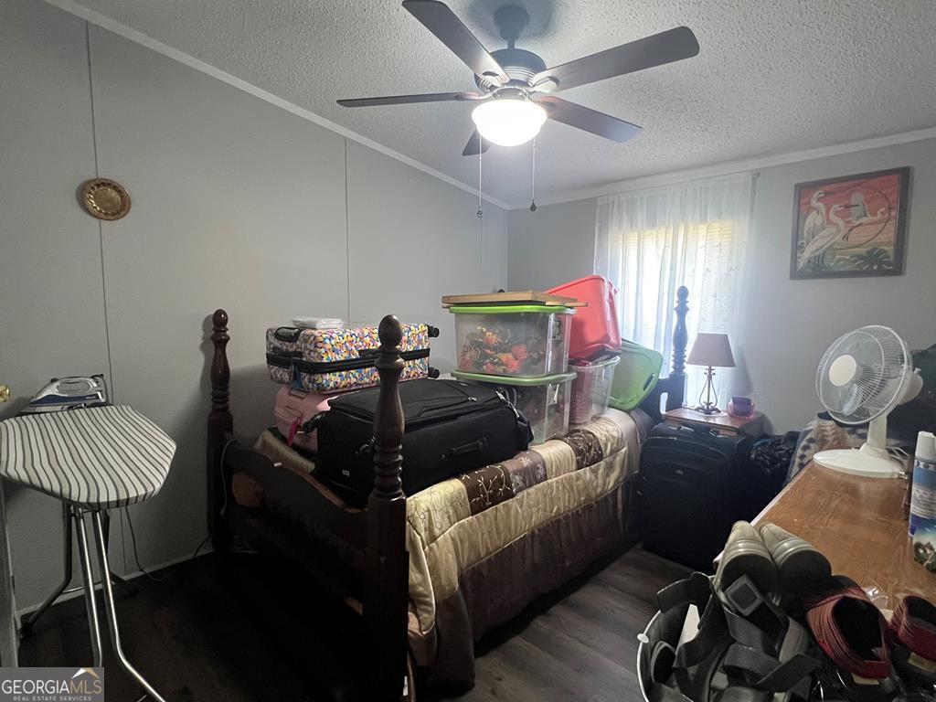 166 Pebble Hills Road Cochran, GA 31014 - Photo 21 of 21 a living room with furniture a rug and a window