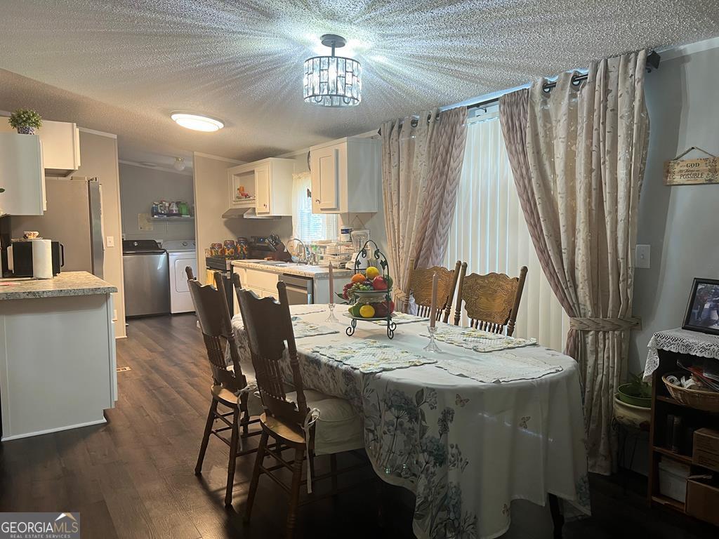 166 Pebble Hills Road Cochran, GA 31014 - Photo 9 of 21 a view of a dining room with furniture window and wooden floor