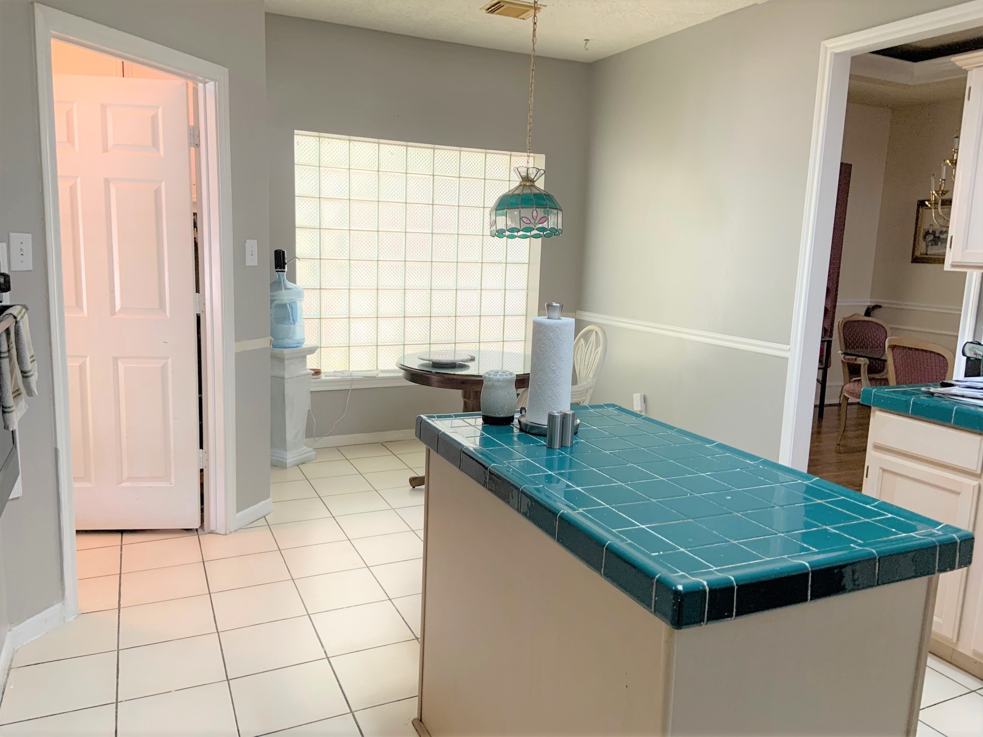 8418 Westnut Lane Houston, TX 77040 - Photo 6 of 13 a kitchen with a sink a counter top space and cabinets