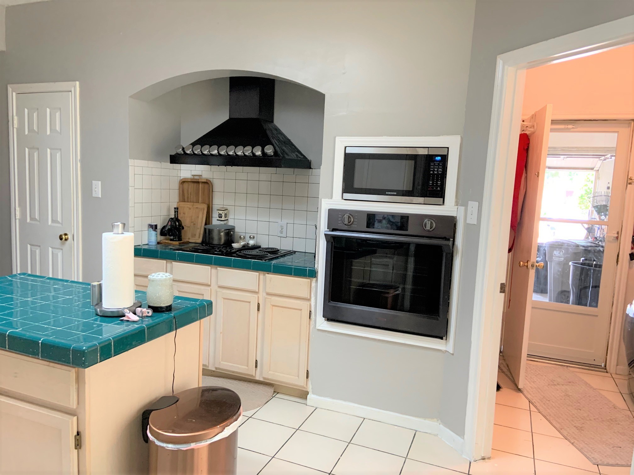 8418 Westnut Lane Houston, TX 77040 - Photo 7 of 13 a kitchen with a stove and a microwave