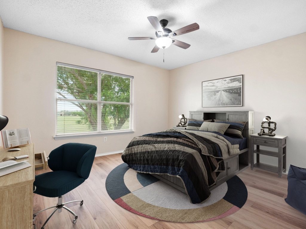 2727 High Point Drive Round Rock, TX 78664 - Photo 14 of 31 Bedroom with wood finished floors, ceiling fan, a textured ceiling, and baseboards