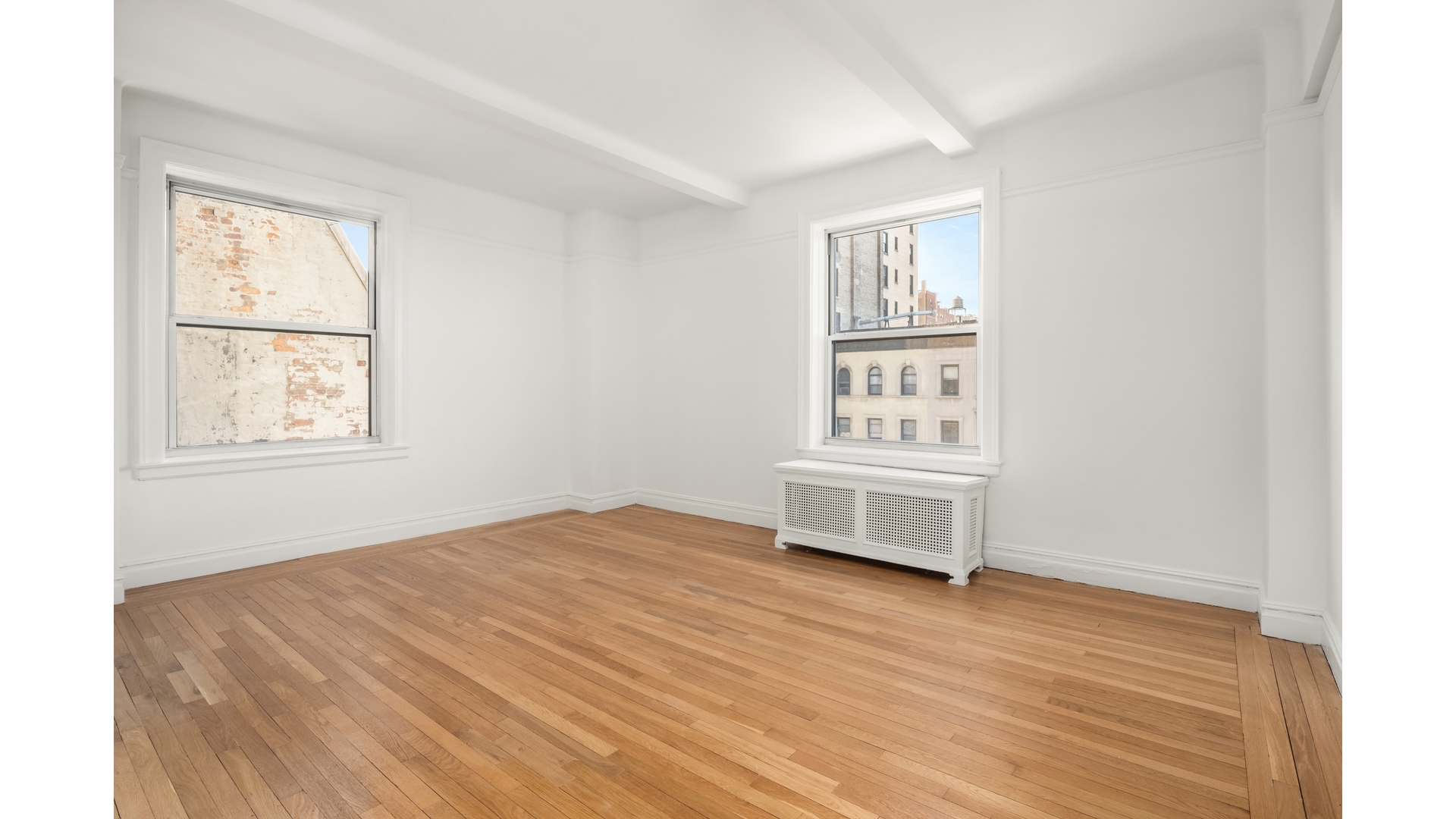 340 Riverside Drive, Unit 6D Manhattan, NY 10025 - Photo 8 of 26 a view of a room with window and wooden floor
