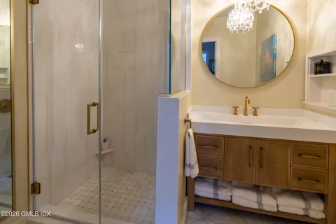 a bathroom with a sink and a mirror