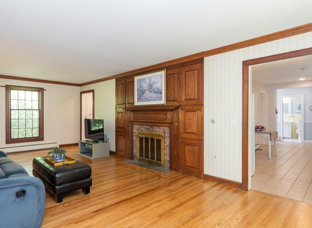 126 Brickyard Road Southampton, MA 01073 - Photo 11 of 41 a living room with furniture and a fireplace