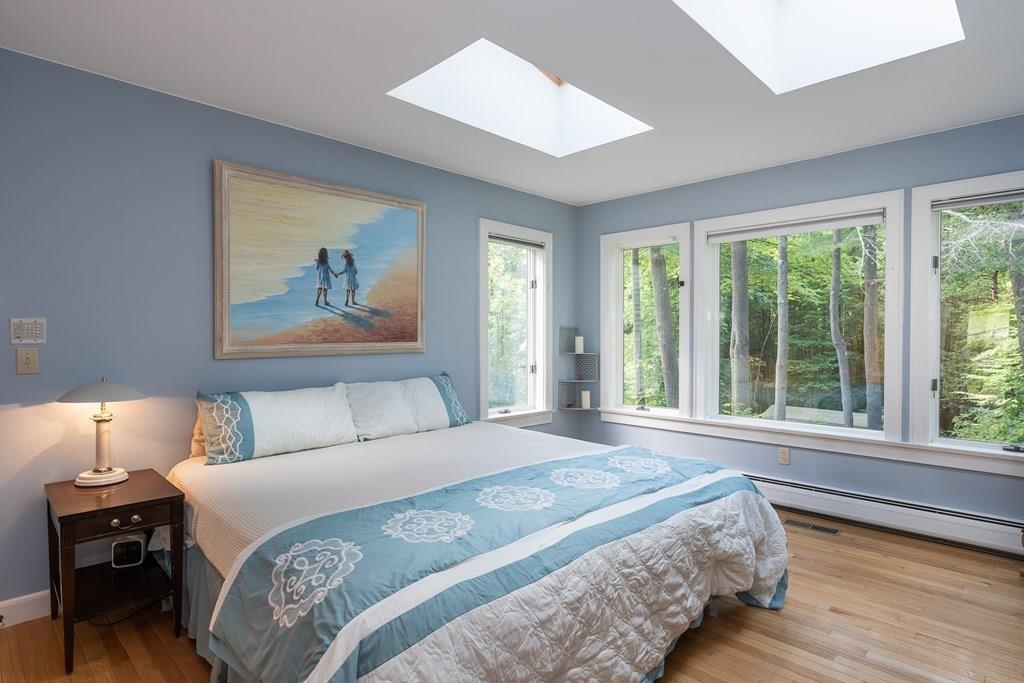 126 Brickyard Road Southampton, MA 01073 - Photo 20 of 41 a bedroom with a large bed and a window