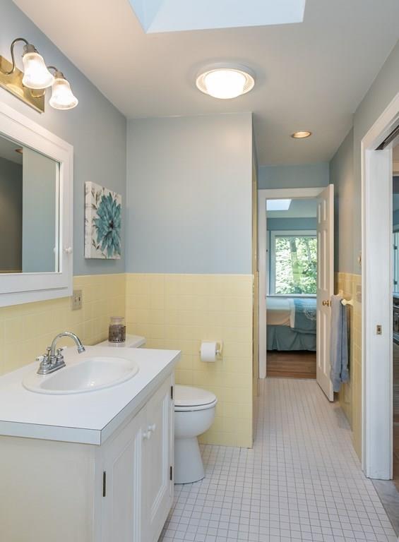 126 Brickyard Road Southampton, MA 01073 - Photo 25 of 41 a bathroom with a sink a toilet and a mirror