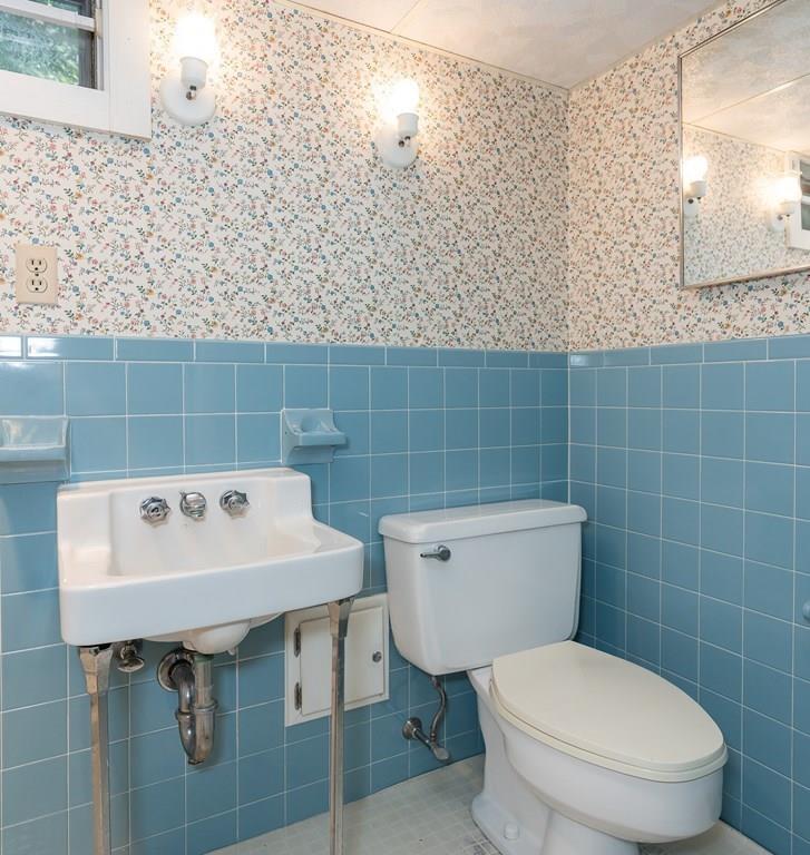 126 Brickyard Road Southampton, MA 01073 - Photo 37 of 41 a bathroom with a sink a toilet and a mirror