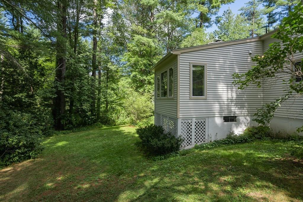 126 Brickyard Road Southampton, MA 01073 - Photo 39 of 41 a view of a backyard with plants and large trees