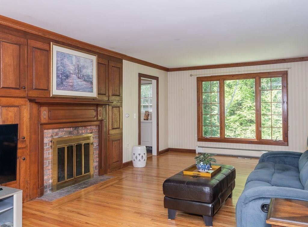 126 Brickyard Road Southampton, MA 01073 - Photo 8 of 41 a living room with furniture and a fireplace