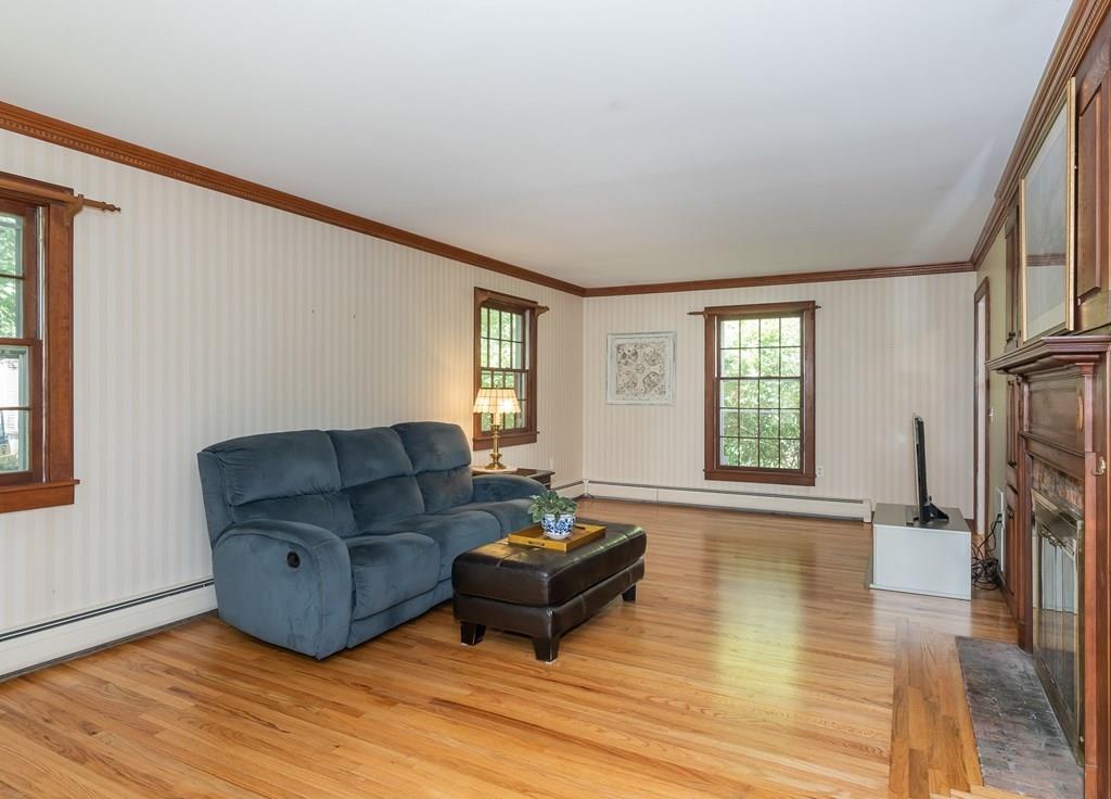 126 Brickyard Road Southampton, MA 01073 - Photo 10 of 41 a living room with furniture and a flat screen tv