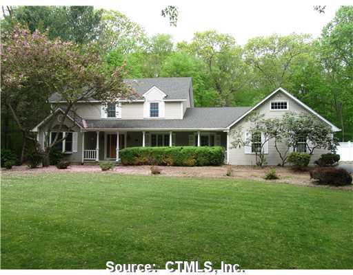 151 East Gate Road Guilford, CT 06437 - Photo 1 of 1 a front view of a house with a yard