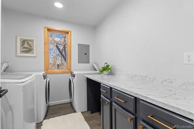a view of bathroom with a sink and a washer