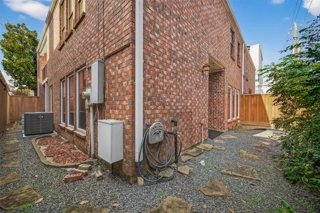 a view of a pathway of a house with backyard