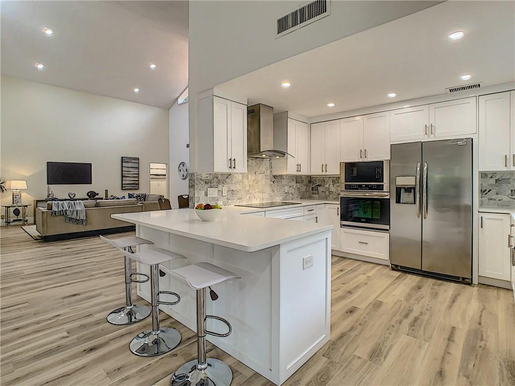 4133 Northwest 28th Way Boca Raton, FL 33434 - Photo 1 of 12 New Custom Kitchen-New Stainless Steel Appliances-New Flooring