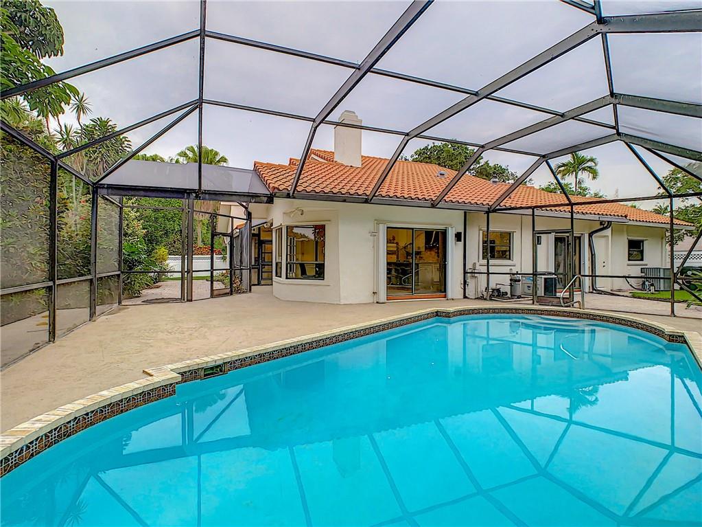 4133 Northwest 28th Way Boca Raton, FL 33434 - Photo 11 of 12 Relaxing New Diamond Brite Pool Fully Enclosed