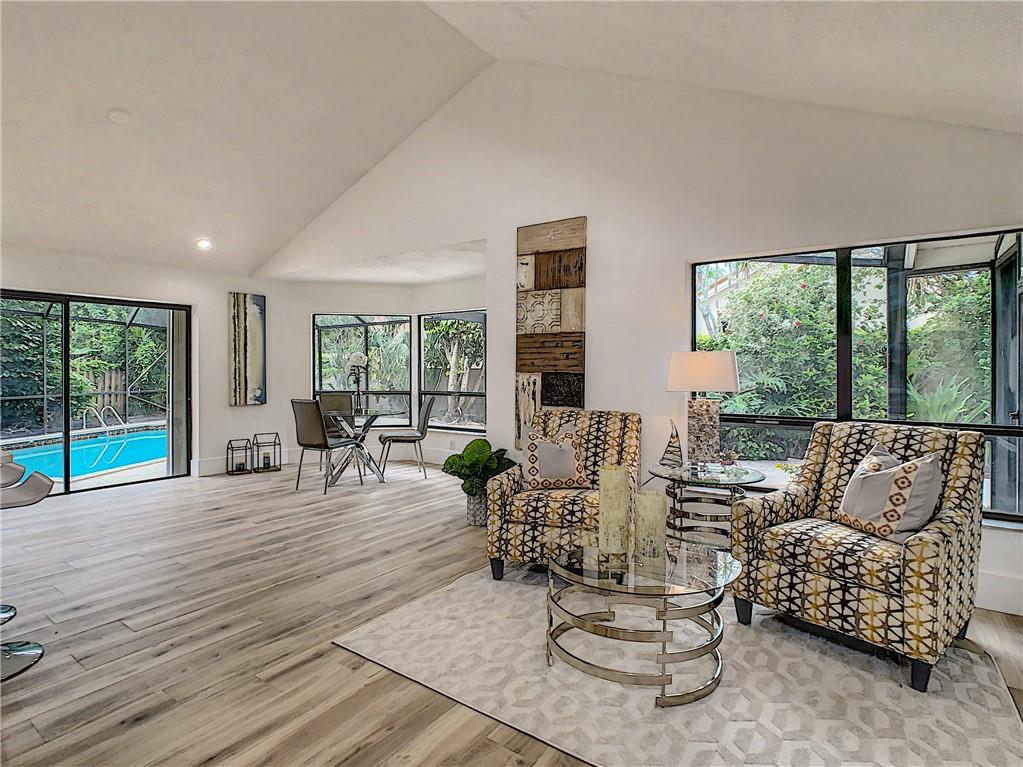 4133 Northwest 28th Way Boca Raton, FL 33434 - Photo 4 of 12 Eat in Kitchen Area-Lounge Area Overlooking Pool