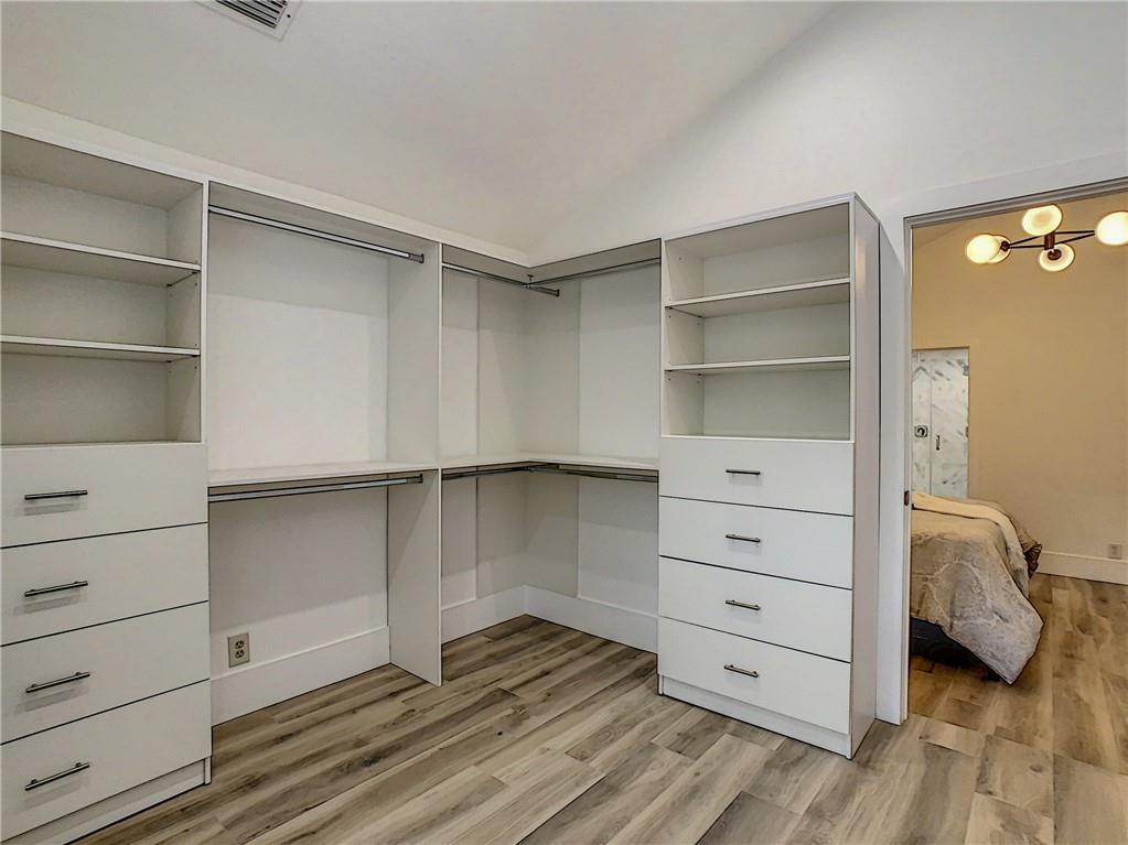 4133 Northwest 28th Way Boca Raton, FL 33434 - Photo 8 of 12 New Custom Cabinetry Master Bedroom Walk In Closet