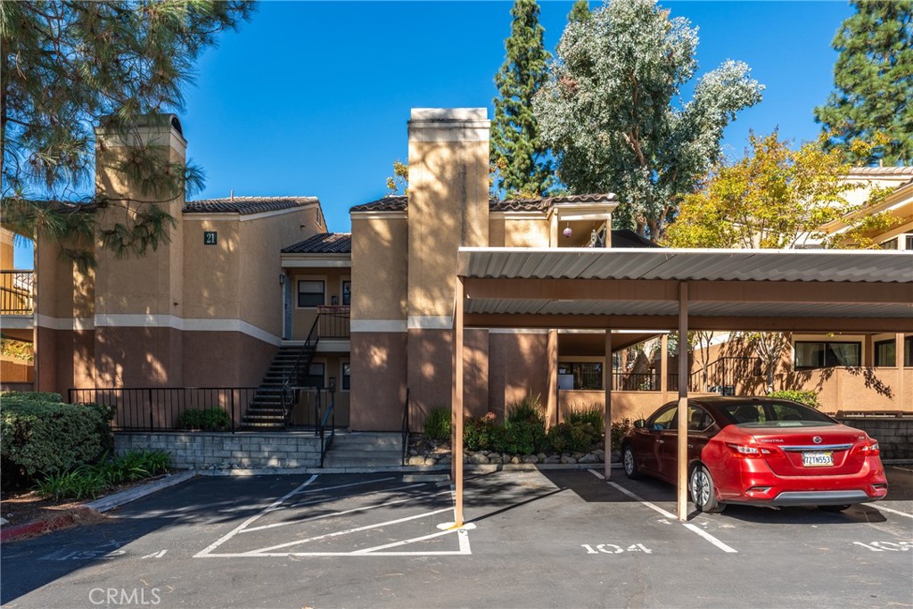 10655 Lemon Avenue Rancho Cucamonga, CA 91737 - Photo 1 of 32 a view of a car park in front of house