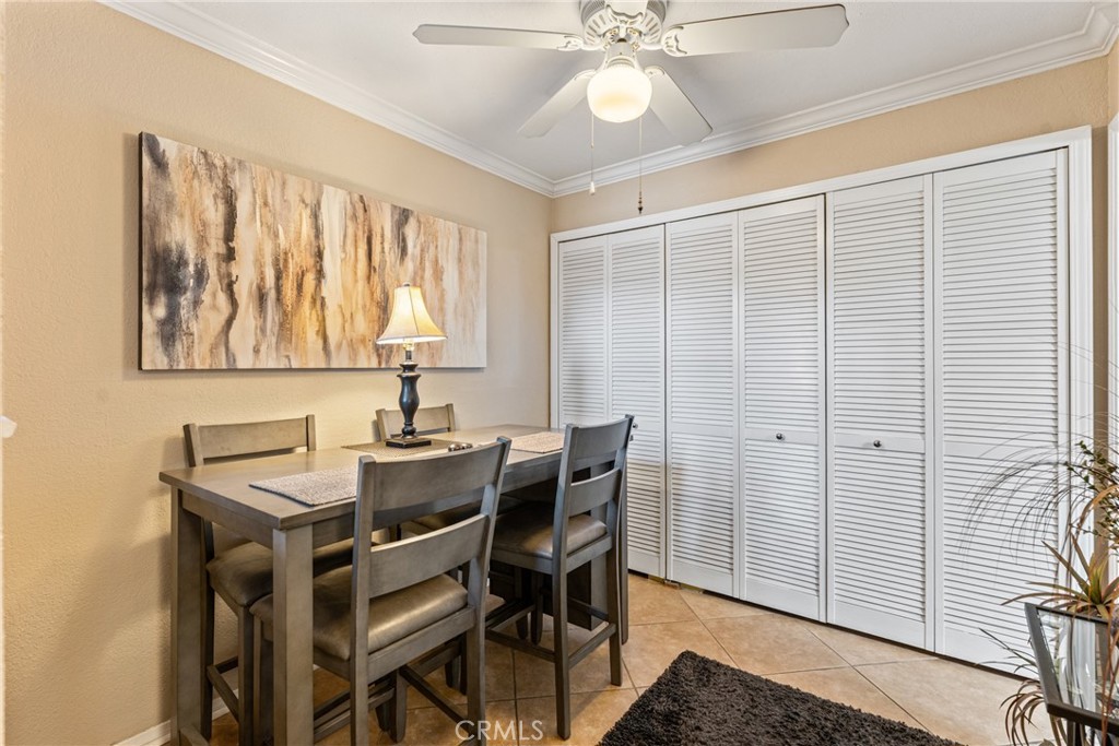 10655 Lemon Avenue Rancho Cucamonga, CA 91737 - Photo 11 of 32 a view of a dining room with furniture and chandelier