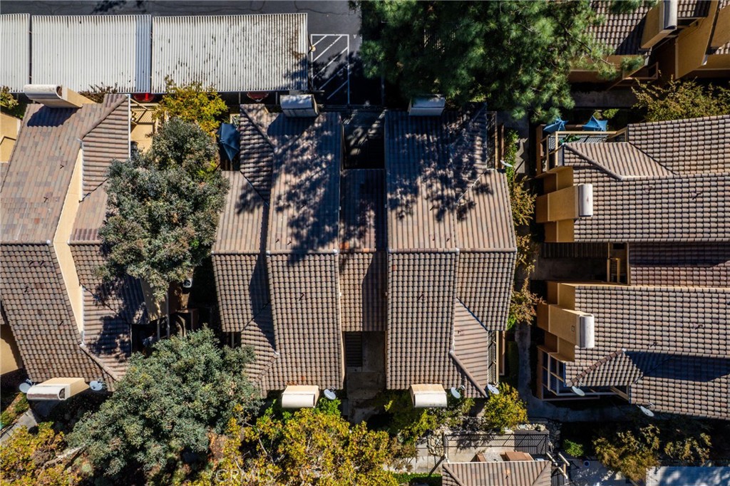 10655 Lemon Avenue Rancho Cucamonga, CA 91737 - Photo 26 of 32 a view of a patio with table and chairs and potted plants