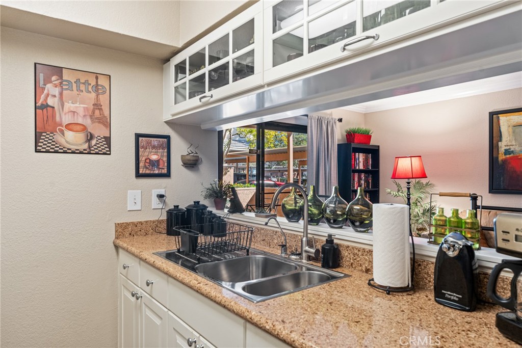 10655 Lemon Avenue Rancho Cucamonga, CA 91737 - Photo 9 of 32 a kitchen with a sink and cabinets