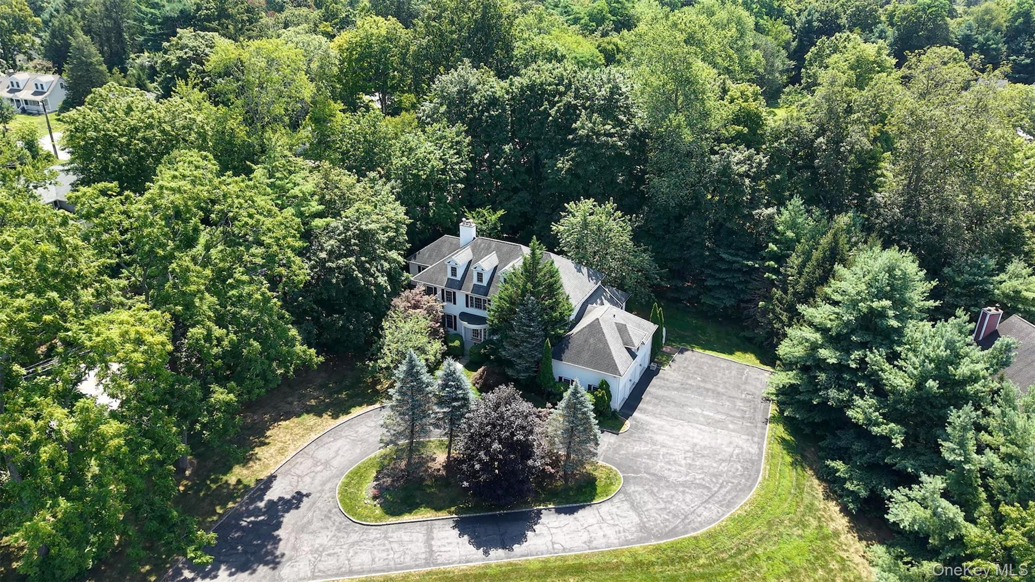 Aerial view of house and property