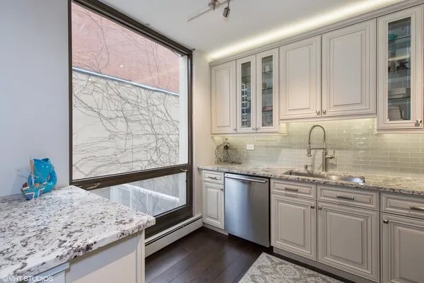 a bedroom with a bed furniture and a window