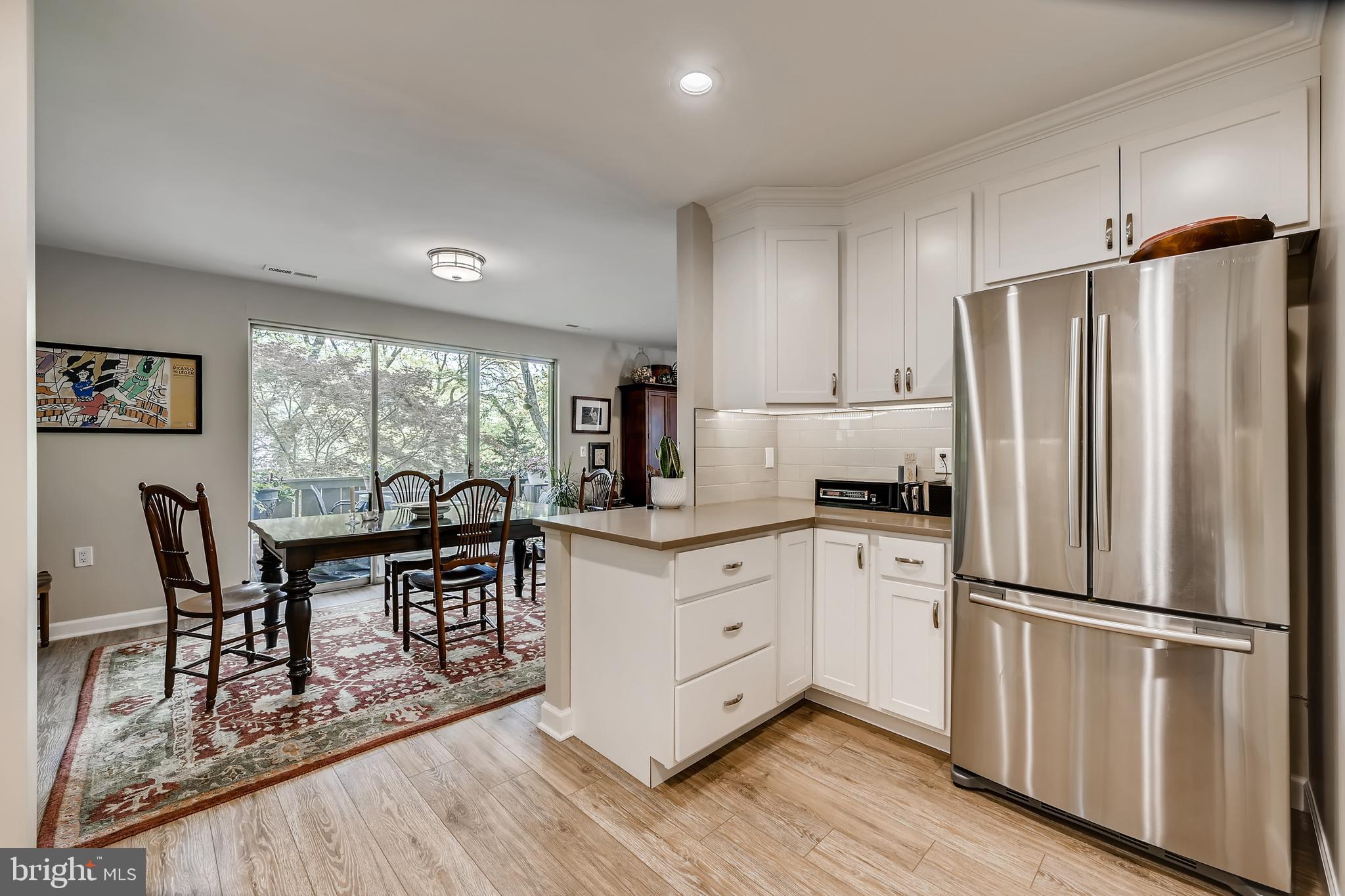 112 Cross Keys Road, Unit R112D Baltimore, MD 21210 - Photo 1 of 17 OPEN kitchen with quartz countertops