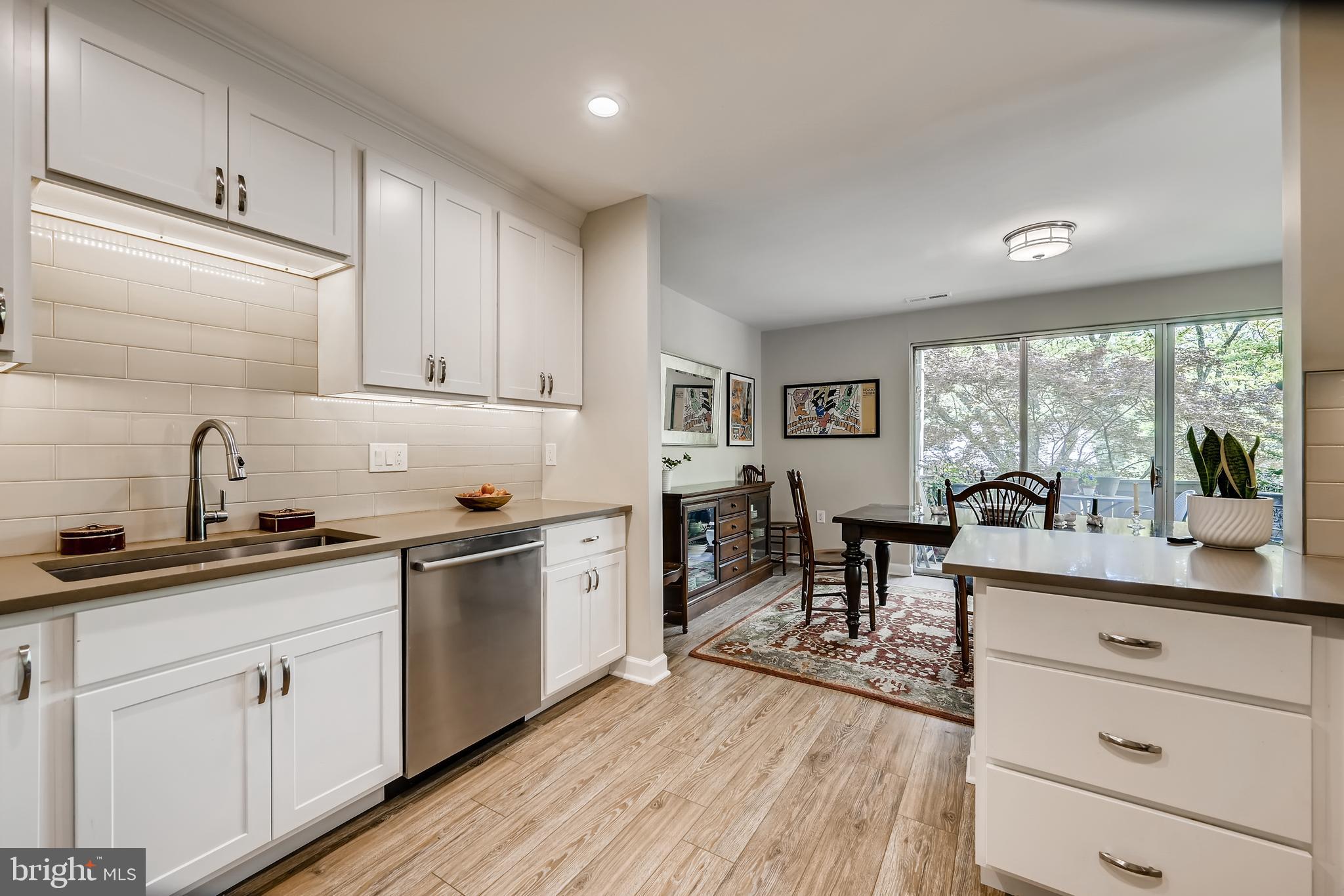 112 Cross Keys Road, Unit R112D Baltimore, MD 21210 - Photo 9 of 17 bright & open kitchen