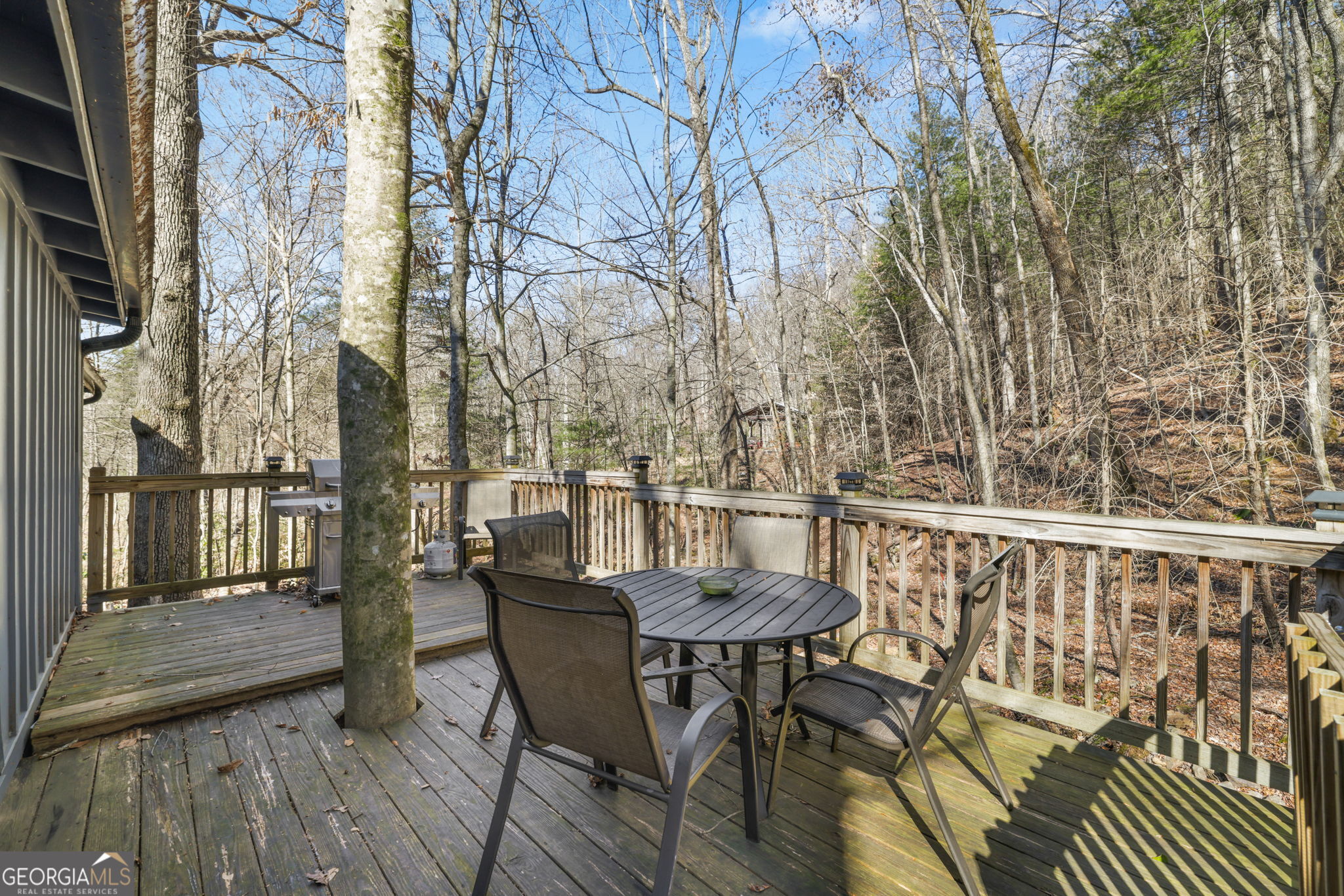 355 Henslee Hollow Lane Rabun Gap, GA 30568 - Photo 31 of 47 a view of balcony with furniture and wooden floor