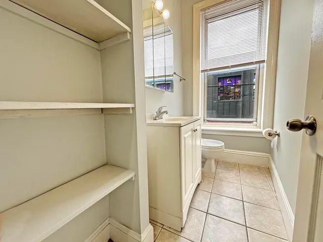 a bathroom with a sink and a shower