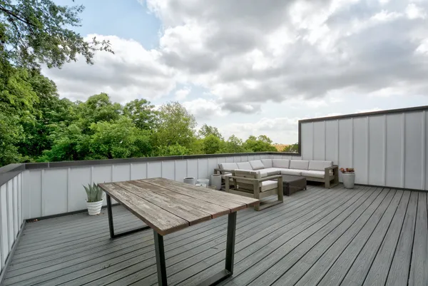 a terrace of a house with wooden floor