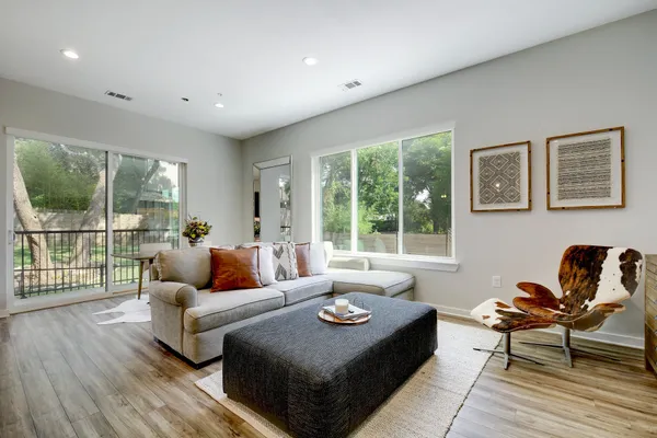 a living room with furniture and a window