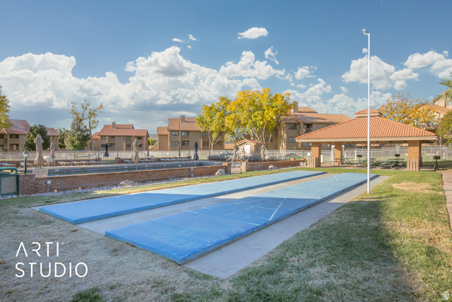 860 South Village Road, Unit A6 St. George, UT 84770 - Photo 21 of 41 Surrounding community with shuffleboard and a residential view