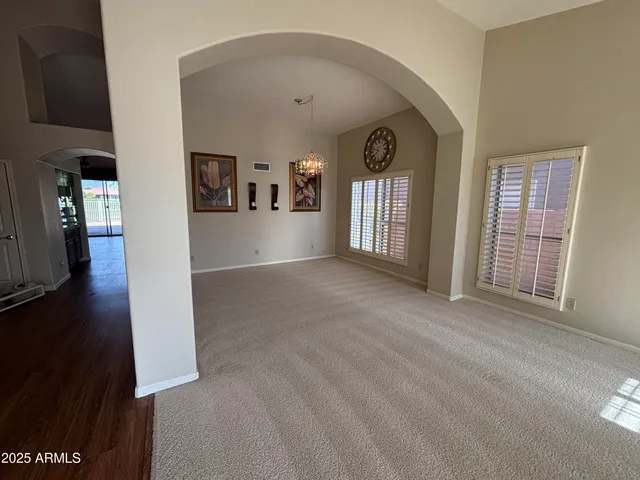 a view of livingroom with furniture and window