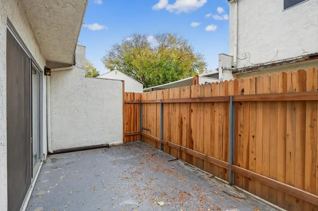 an aerial view of a house with a swimming pool