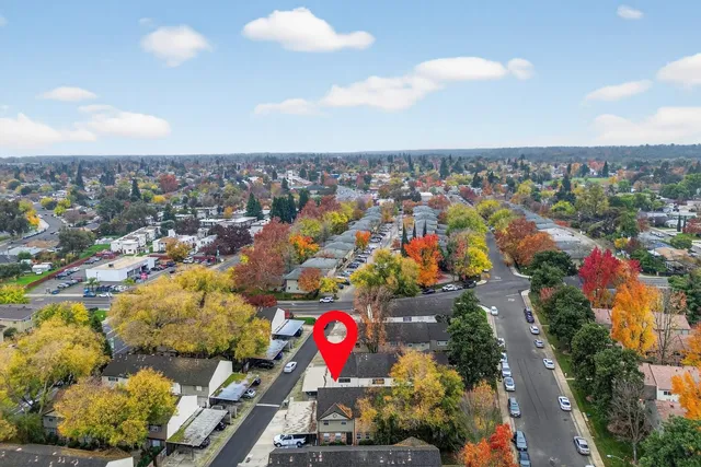 an aerial view of a house with a garden