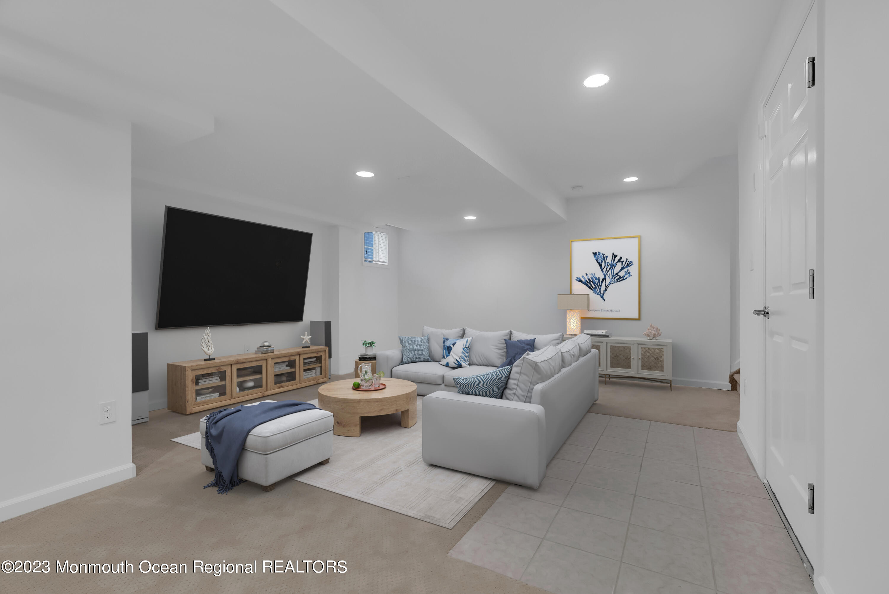 16 Mariners Bend Brielle, NJ 08730 - Photo 45 of 66 a living room with furniture and a flat screen tv